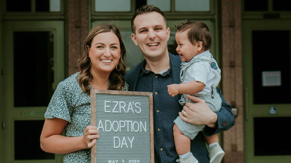 David and Ashley Thompson holding their son, Ezra